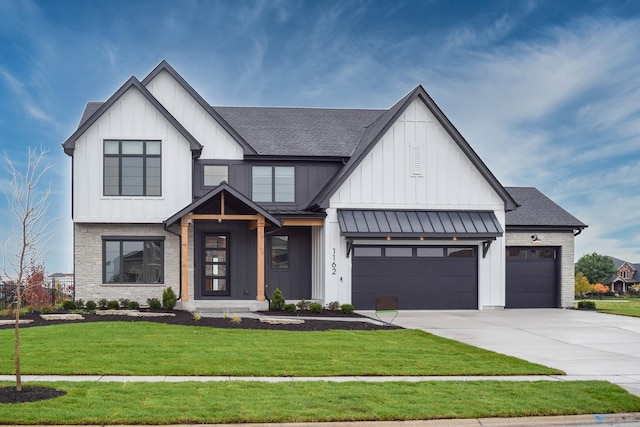 26327 Baxter Dr, Plainfield, IL 60544 - modern farmhouse with board and batten siding, a standing seam roof, concrete driveway, and roof with shingles