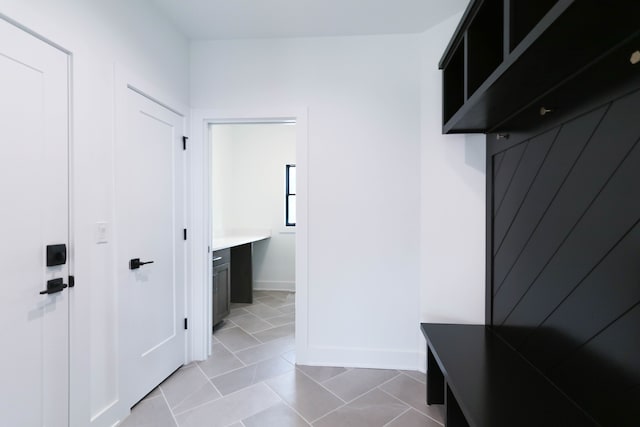 mudroom featuring light tile patterned floors