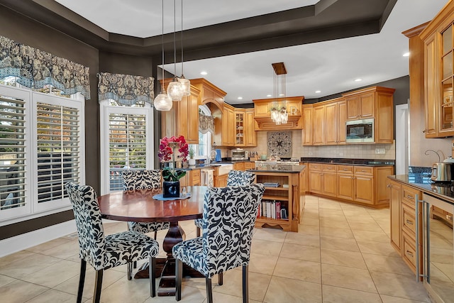 dining space featuring light tile patterned floors, wine cooler, and recessed lighting