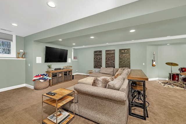 living room featuring carpet, visible vents, baseboards, and recessed lighting