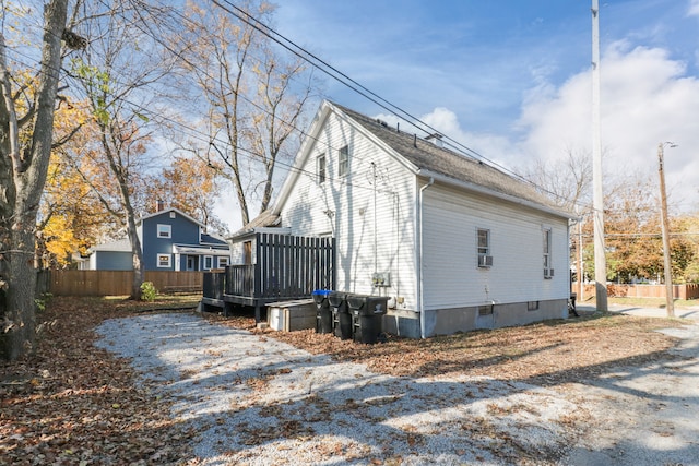 view of home's exterior with a deck