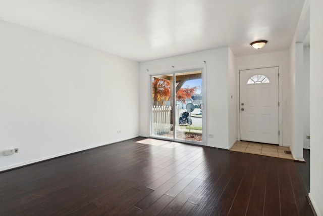 foyer entrance with light hardwood / wood-style flooring