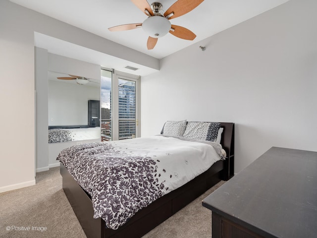 bedroom featuring carpet and ceiling fan