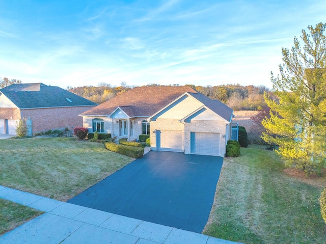 ranch-style home with a garage and a front lawn