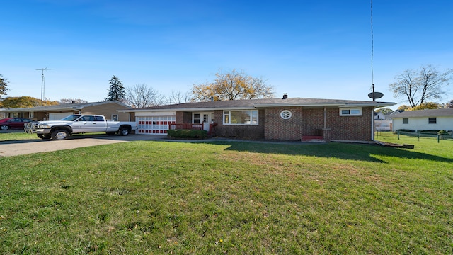 single story home featuring a front yard