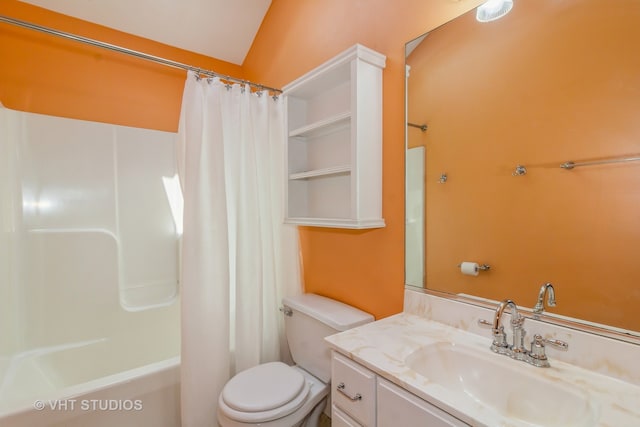 full bathroom with vanity, toilet, shower / tub combo with curtain, and vaulted ceiling