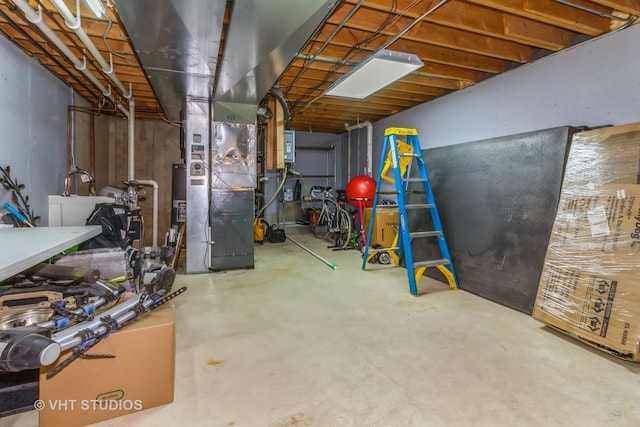 basement featuring heating unit