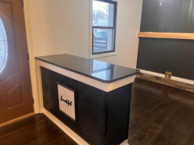 bar with backsplash, beamed ceiling, and wood ceiling