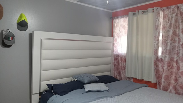 bedroom featuring ornamental molding