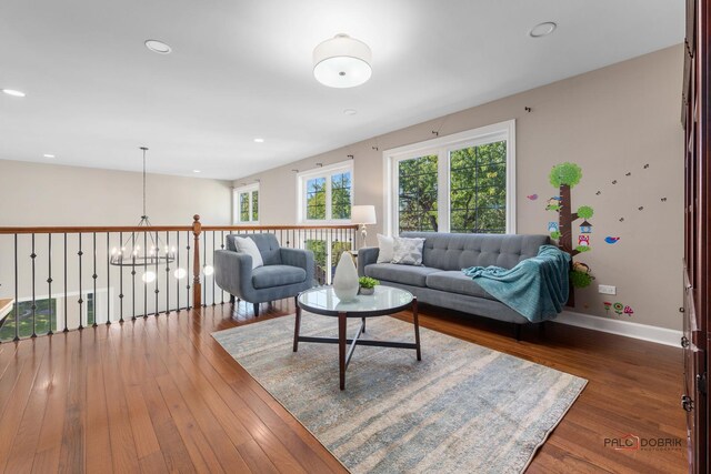 living room with light hardwood / wood-style flooring