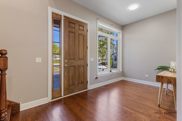 entrance foyer with hardwood / wood-style floors