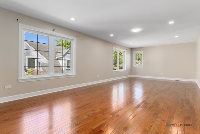 empty room featuring hardwood / wood-style floors