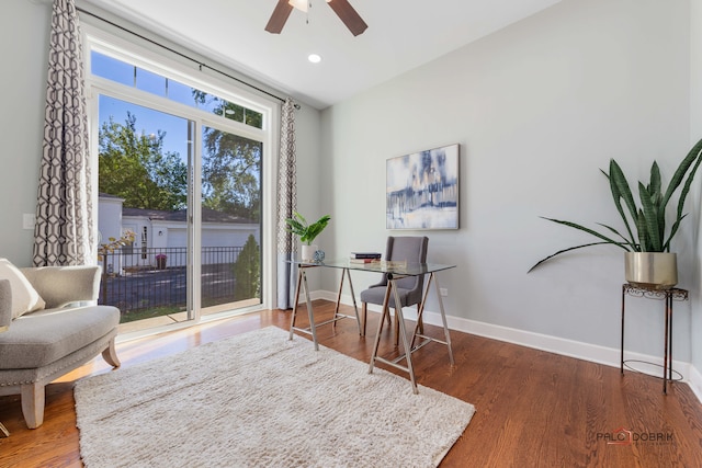 office area with hardwood / wood-style flooring and ceiling fan