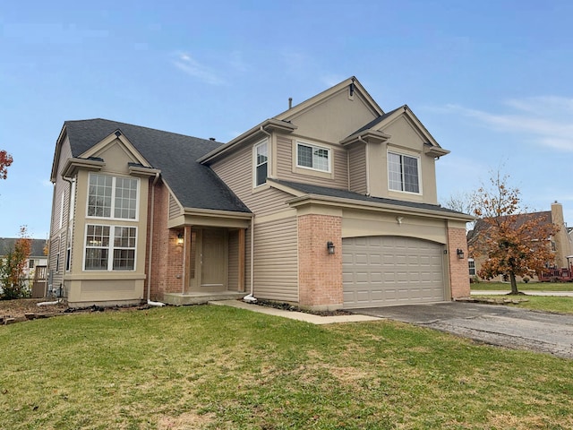 view of front facade featuring a garage and a front yard