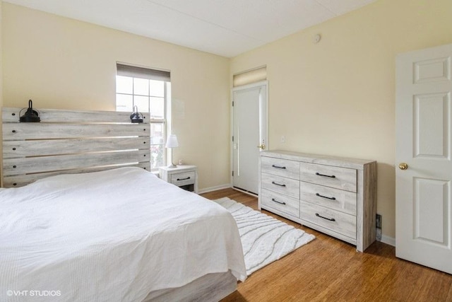 3135 Town Square Dr Unit 106, Rolling Meadows, IL 60008 - bedroom featuring light wood finished floors and baseboards