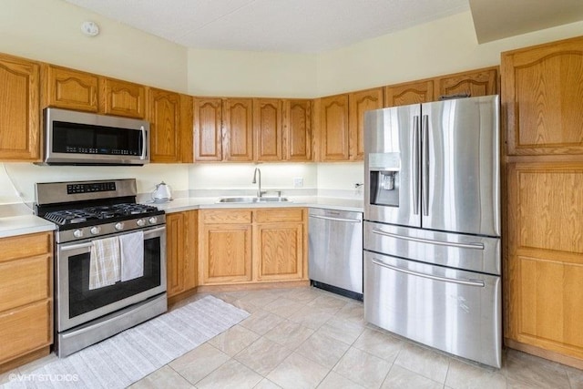3135 Town Square Dr Unit 106, Rolling Meadows, IL 60008 - kitchen with appliances with stainless steel finishes, light countertops, and light tile patterned floors