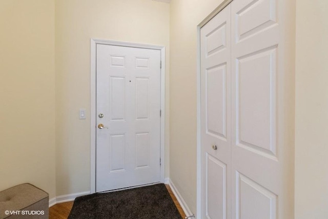 3135 Town Square Dr Unit 106, Rolling Meadows, IL 60008 - doorway to outside with baseboards and dark wood-style floors