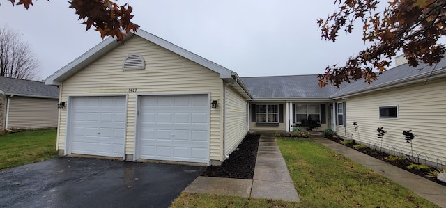 single story home with a garage