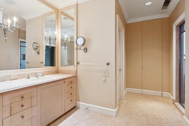 bathroom with vanity and crown molding