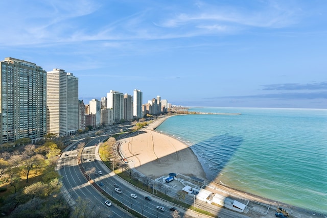 aerial view with a beach view and a water view