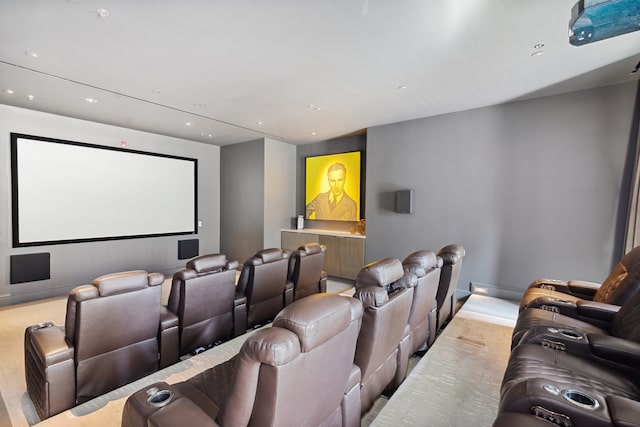 cinema room featuring light carpet