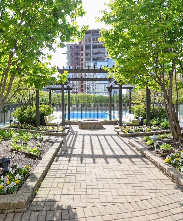 surrounding community with a patio area