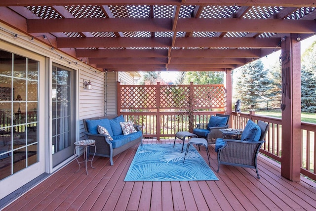 wooden deck featuring a pergola and an outdoor living space