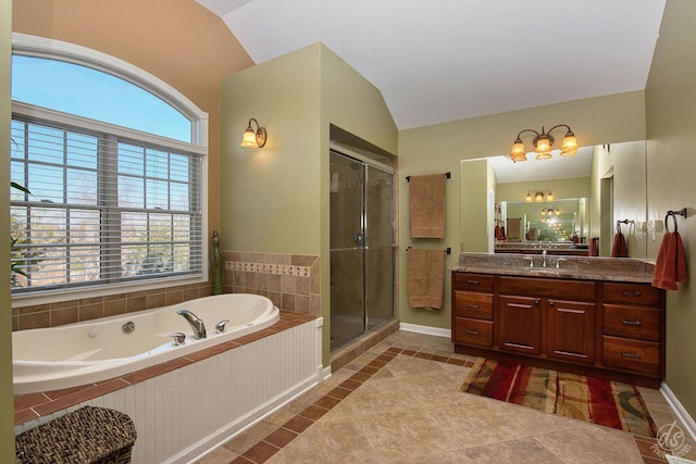 bathroom featuring tile patterned flooring, vanity, vaulted ceiling, and independent shower and bath