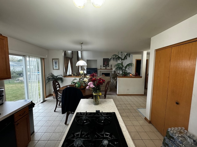 kitchen with pendant lighting and black gas cooktop