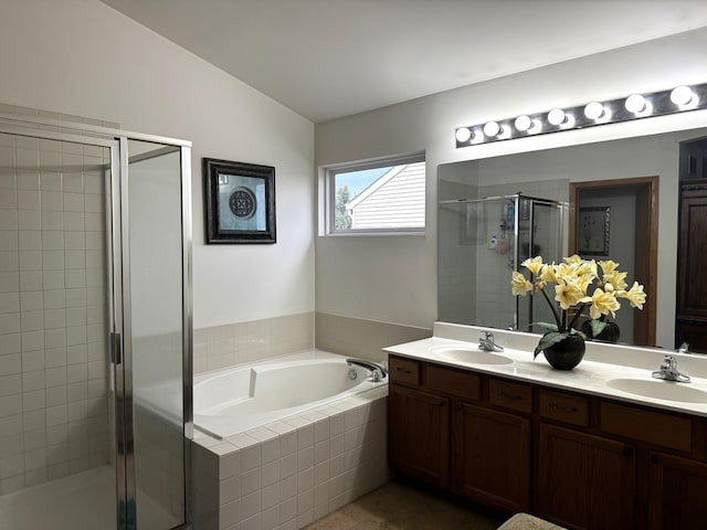 bathroom featuring vanity, lofted ceiling, and plus walk in shower