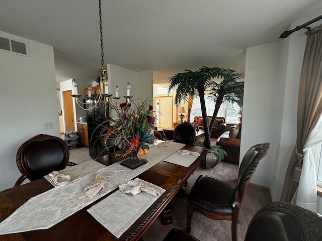 dining room with a notable chandelier