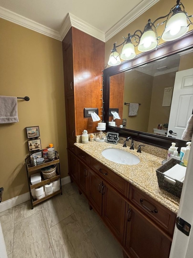 bathroom featuring vanity and ornamental molding