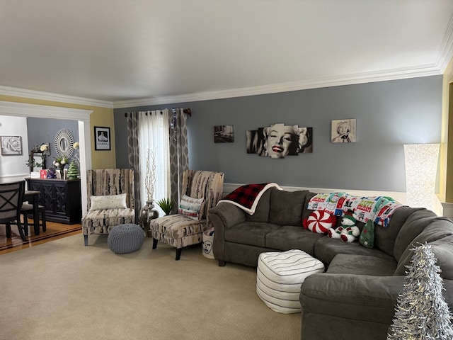 carpeted living room with crown molding