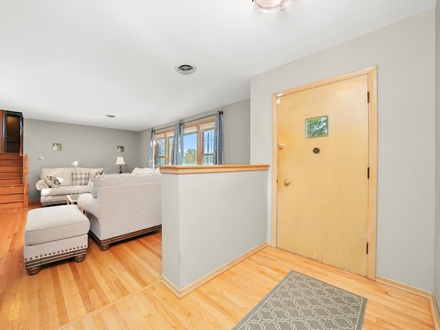 foyer featuring hardwood / wood-style floors