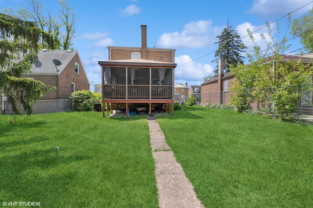 1242 E 98th St, Chicago, IL 60628 - rear view of property with a sunroom and a chimney