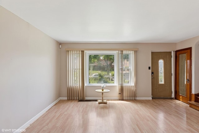 1242 E 98th St, Chicago, IL 60628 - entryway featuring light wood-style flooring and baseboards