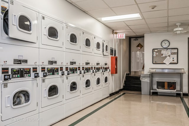 washroom with separate washer and dryer, ceiling fan, and stacked washer and dryer