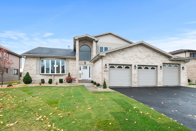 view of front facade featuring aphalt driveway, brick siding, a garage, and a front lawn