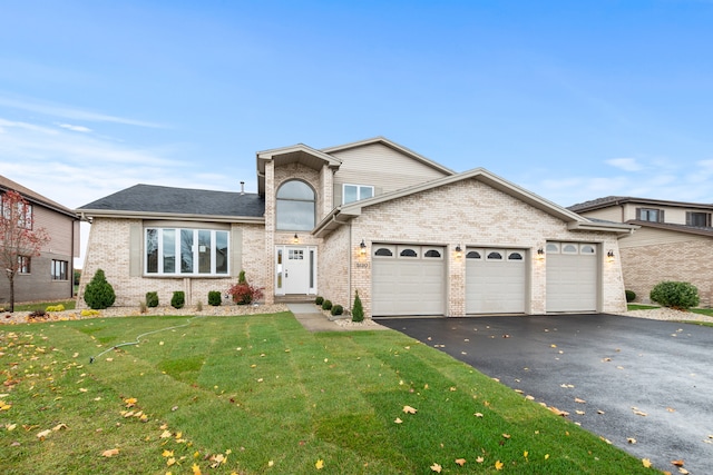 view of front facade featuring a garage and a front yard