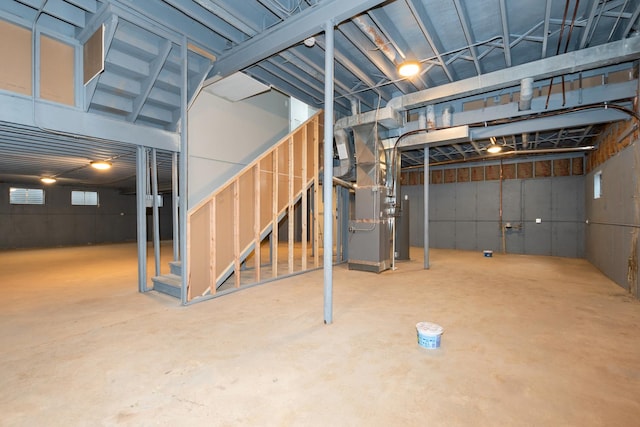 below grade area with stairway and a garage