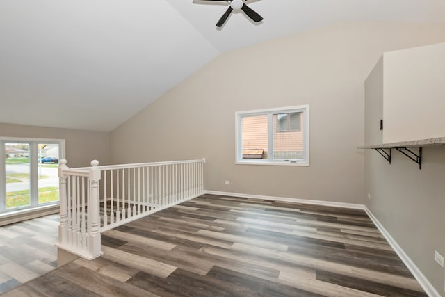 bonus room featuring hardwood / wood-style floors, ceiling fan, and vaulted ceiling