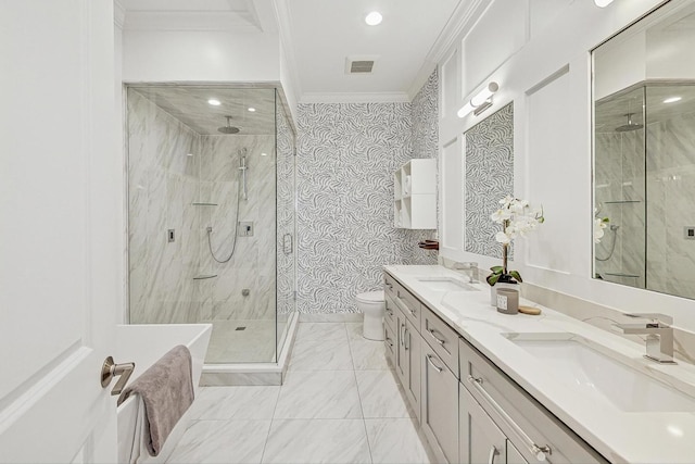 bathroom with crown molding, vanity, toilet, and an enclosed shower