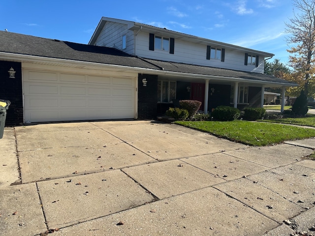 view of front of property featuring a garage