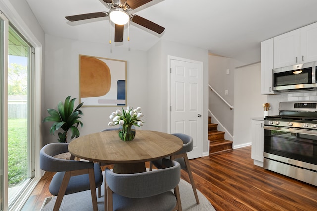 dining area with dark hardwood / wood-style flooring and a wealth of natural light