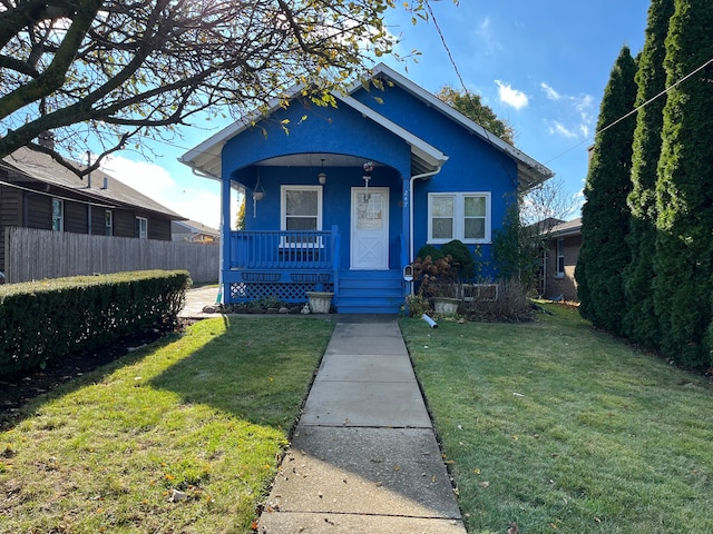 bungalow with a front lawn