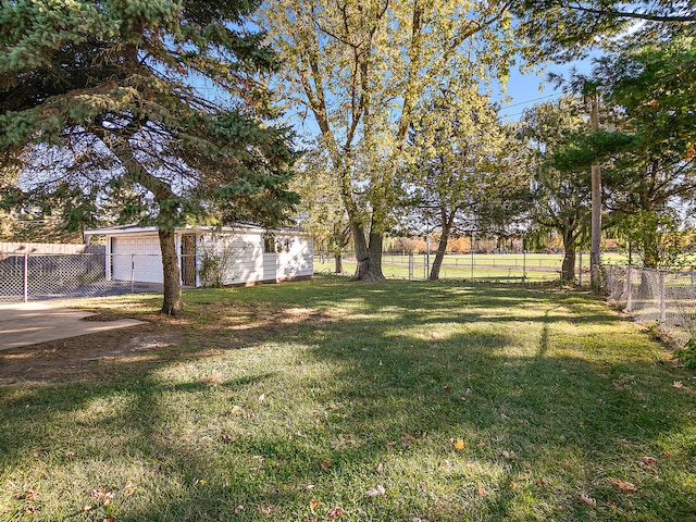 view of yard featuring a garage