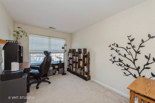 view of carpeted office space