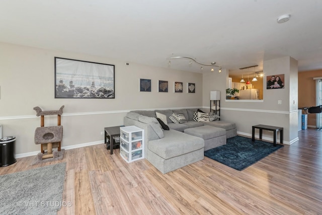 living room with wood-type flooring