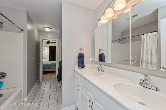 bathroom with tile patterned flooring, ceiling fan, vanity, and shower / tub combo