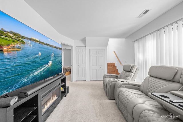 living room featuring light colored carpet